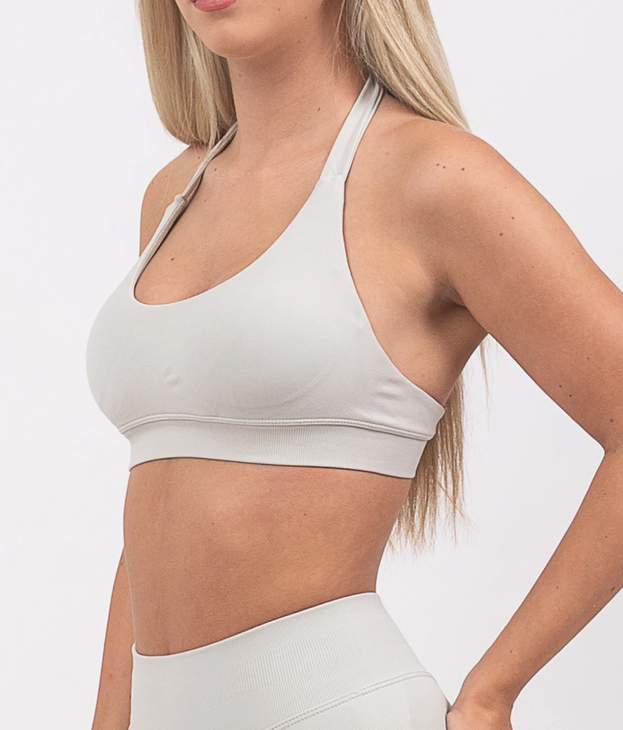 Ira-light-gray-top-na-bretele-2-1-1 Ira light gray sports bra - Image 1
